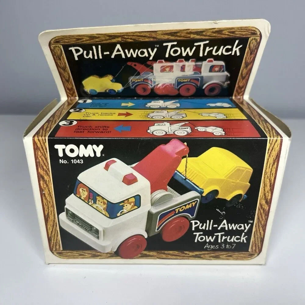 Tomy Pull-Away Toy Tow Truck Vintage 1984 No. 1043 Complete With Box & Booklet